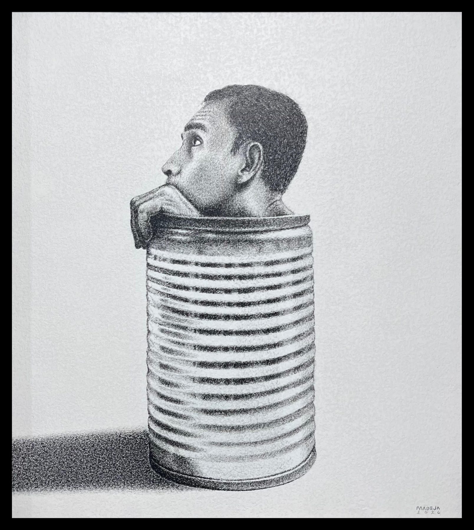 Lata: a man folded inside a corrugated tin can, chin on fist, looking upward